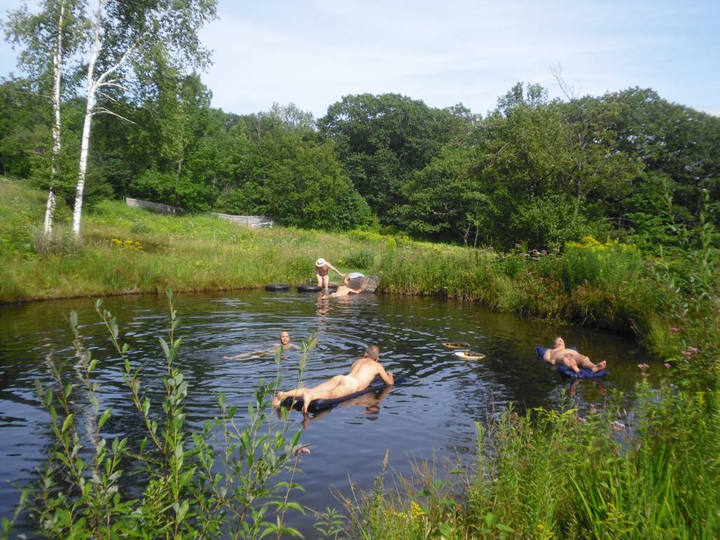 Men enjoying the swimming pond at Frog Meadow